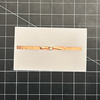 I then taped the light down on top of my first piece of tape.