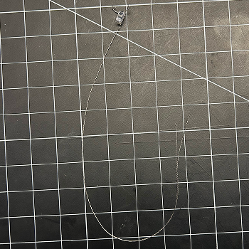 I twisted the thread together to secure it and thicken it so it wouldn't hurt my hand.