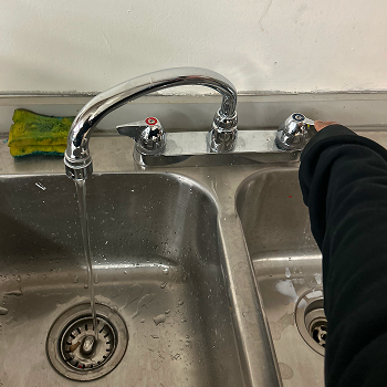 Interaction: Turning on a faucet.