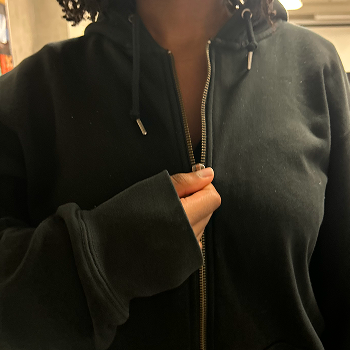 Interaction: Zipping up a sweater.